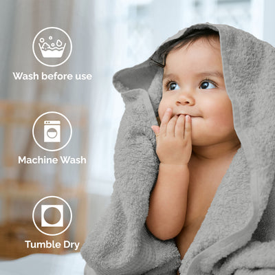 Child wrapped in a gray towel, looking up with a hand near their mouth, with care instructions displayed beside them.