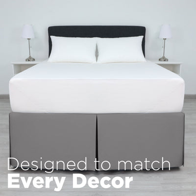 Gray bed skirt with a 21-inch drop, covering the bed's base and designed to fit various decor styles.
