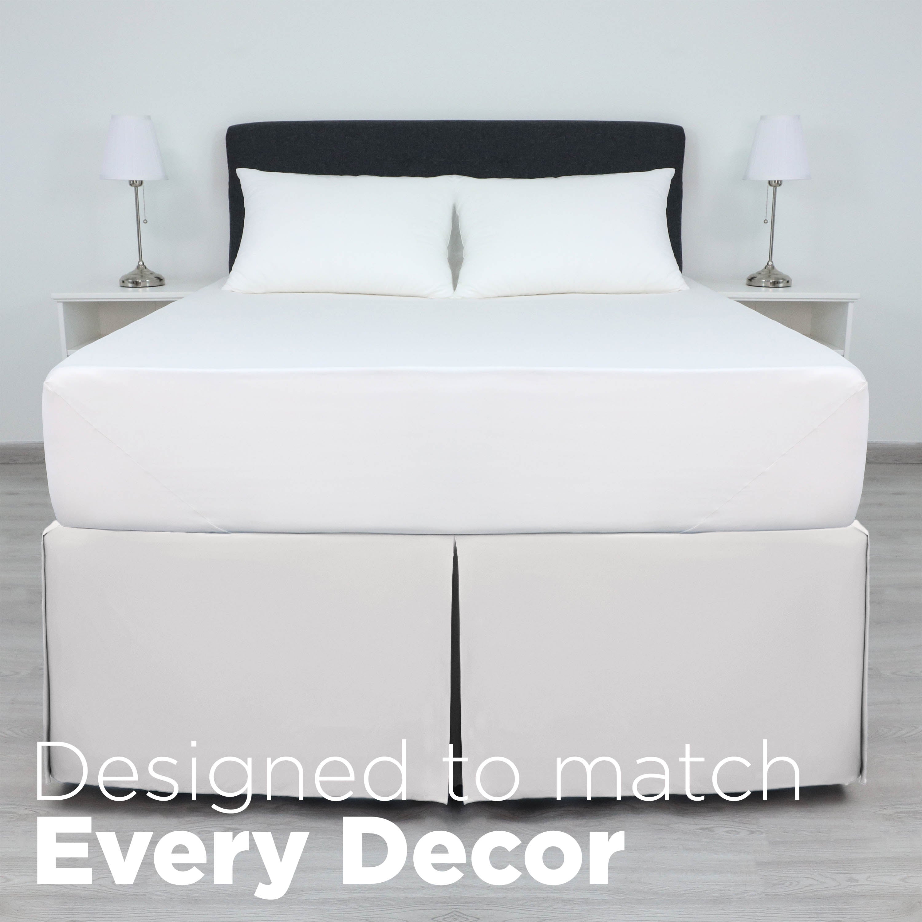 White bed skirt with a 21-inch drop, covering the bed's base, paired with white pillows and a dark headboard.