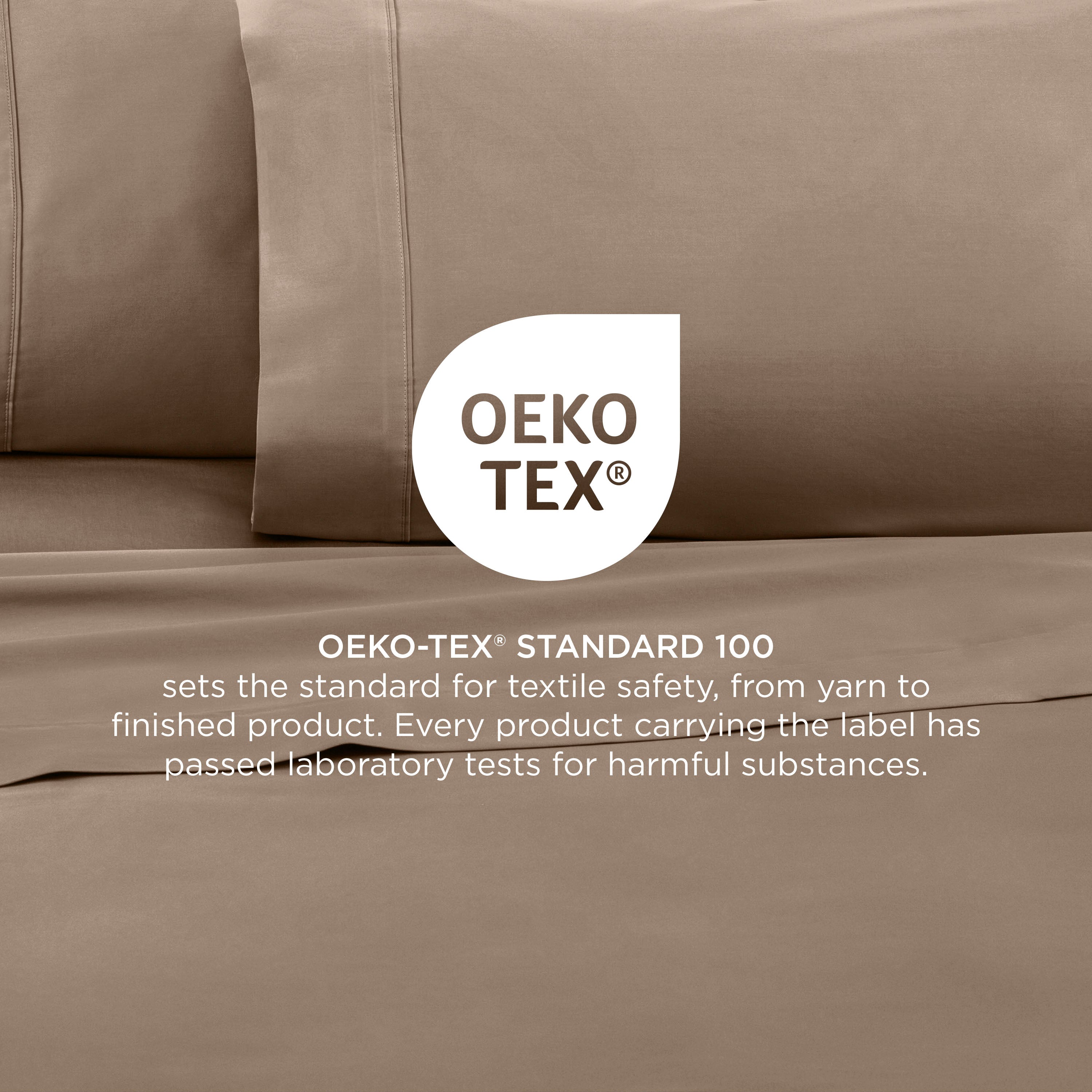 Close-up of beige cotton sheets with Oeko-Tex certification label and text about textile safety standards.