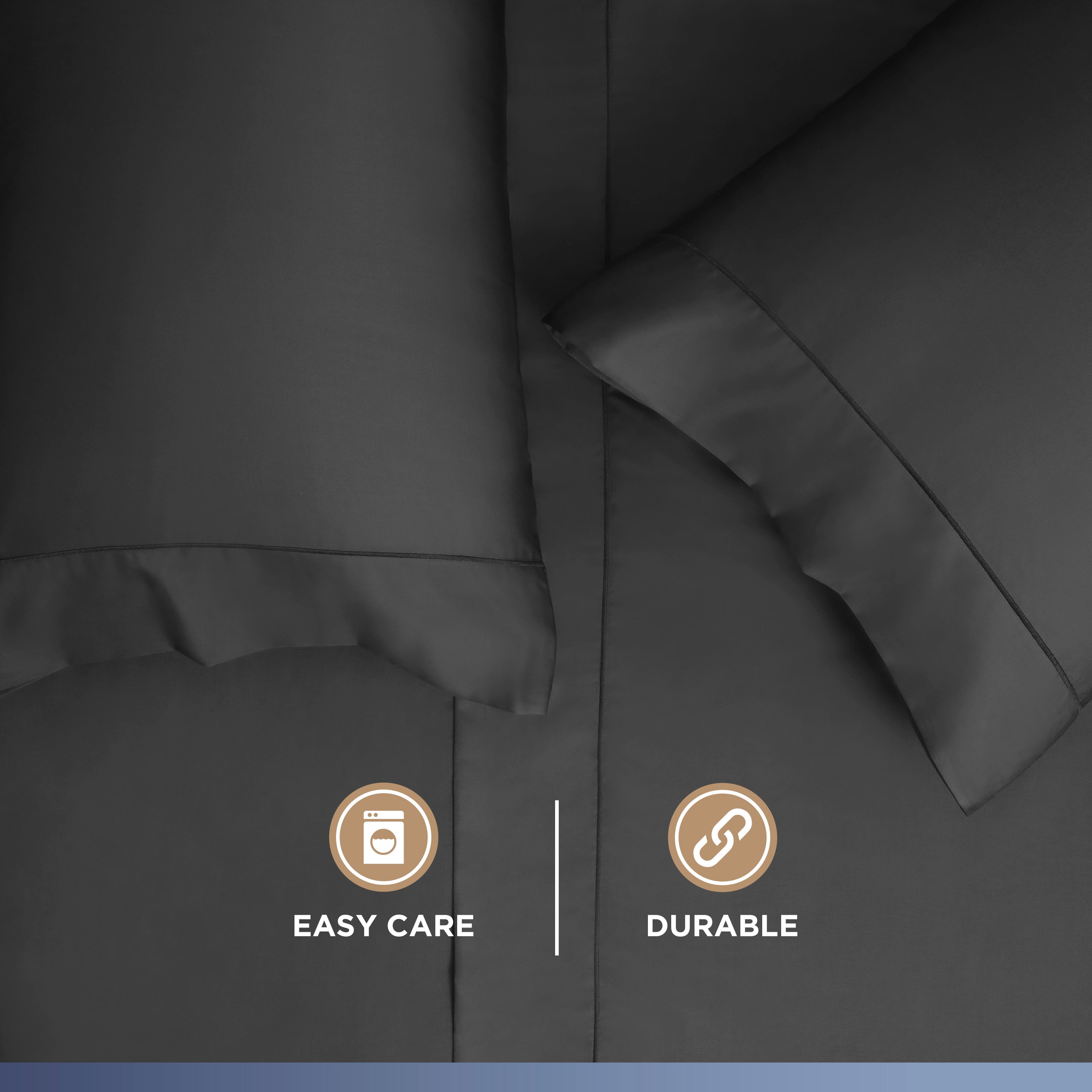 Dark gray sheets and pillowcases with a smooth texture and care icons for easy maintenance and durability.