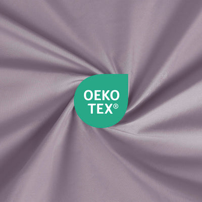 Soft, lavender fabric with an Oeko-Tex certification logo in the center.