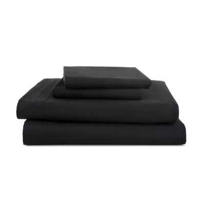 Four-piece black sheet set stacked neatly, featuring a fitted sheet, flat sheet, and two pillowcases.