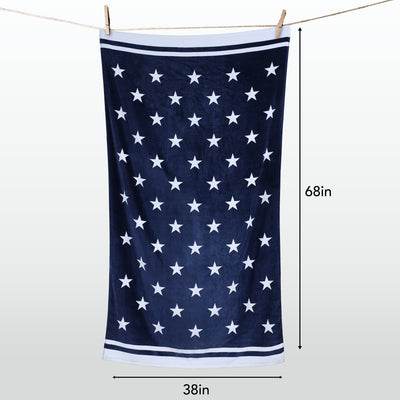 Navy blue towel with white star pattern hanging on a line, with measurements indicated.
