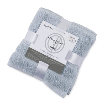 Four soft blue wash cloths neatly stacked and wrapped with a label indicating the product details.