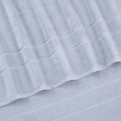 Light gray wash cloths with textured stripes and a soft, absorbent fabric.