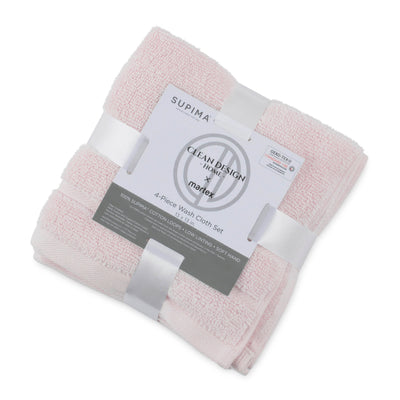 Four pink wash cloths neatly stacked and wrapped with a label indicating the product details.
