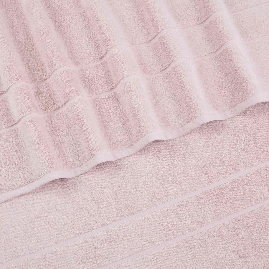 https://westpointhome.com/cdn/shop/files/Martex-Clean-Design-Blush-Hanging-Towels-3000px_1080x1080.jpg?v=1684137766