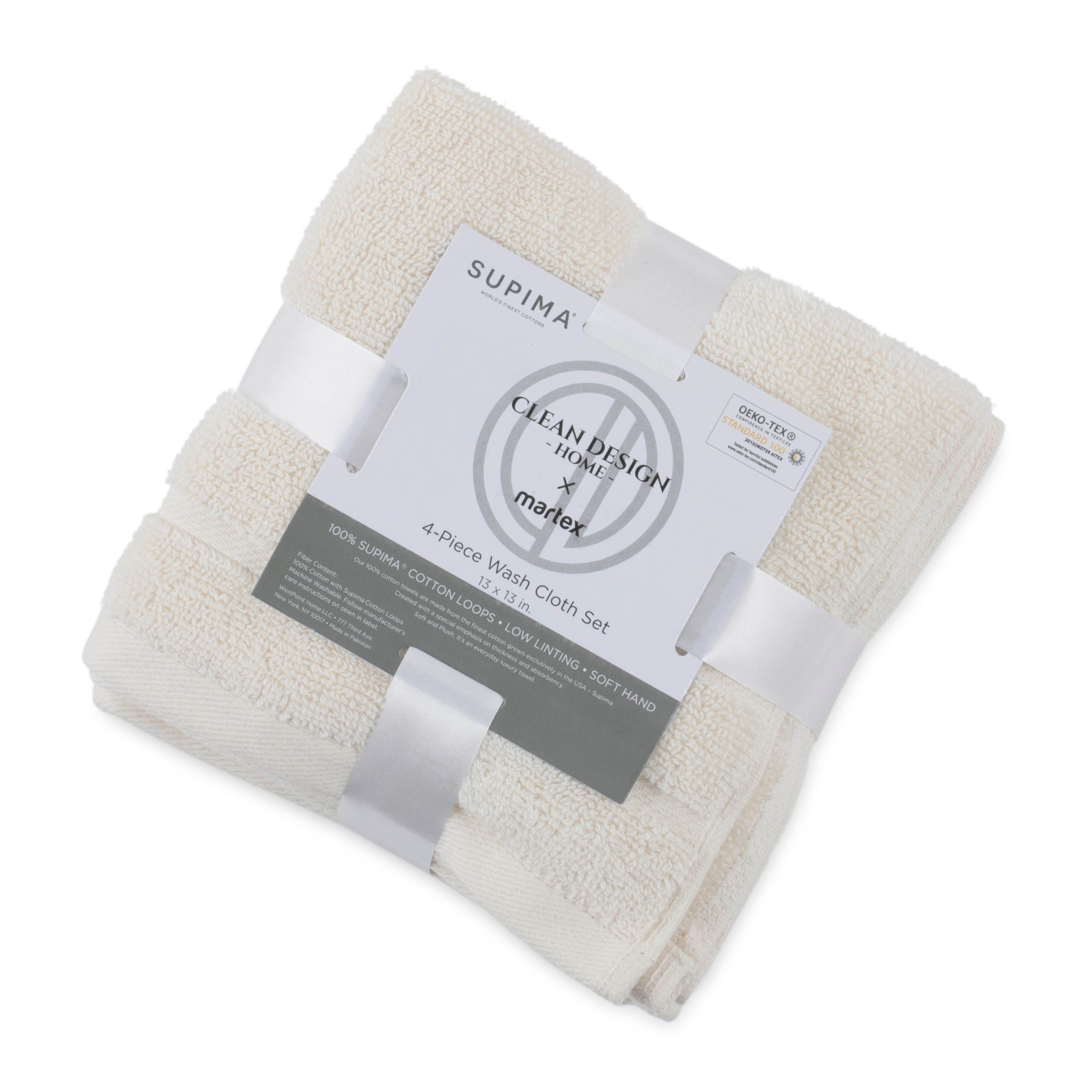 Four white wash cloths neatly stacked and wrapped with a label, measuring 13 x 13 inches each.