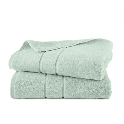 Two stacked bath towels in a soft mint green color with a textured finish.