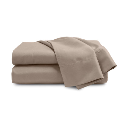 Brushed microfiber sheet set in a neutral beige color, neatly folded with a smooth texture.