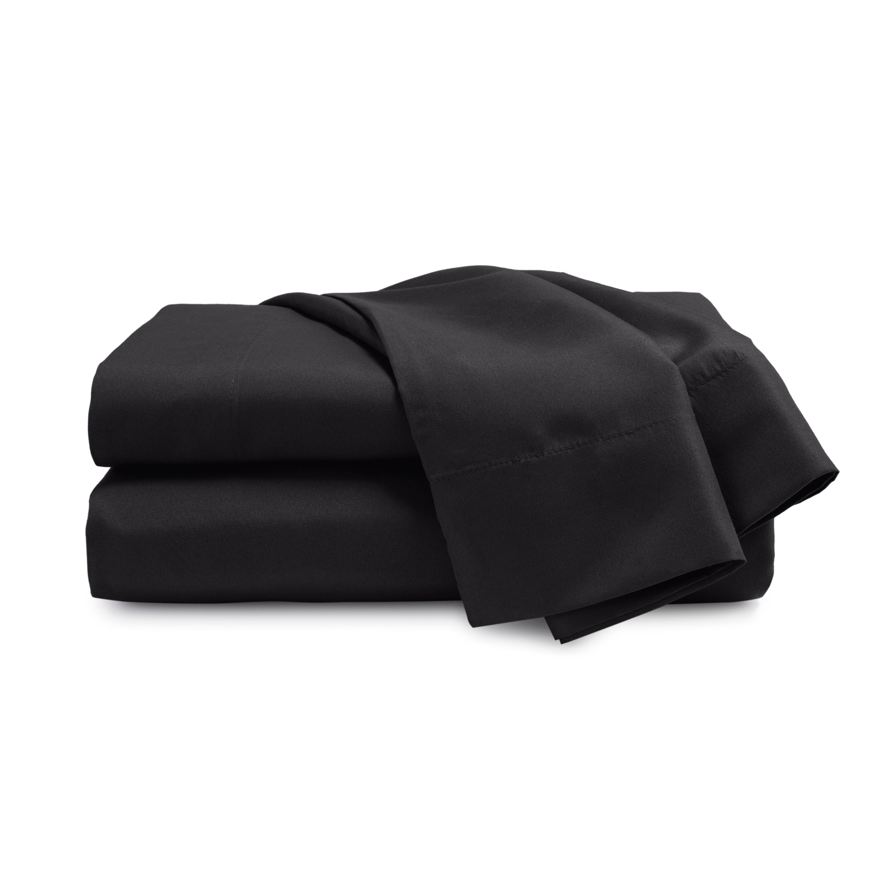 Black brushed microfiber sheet set neatly folded with a smooth finish.
