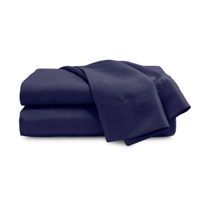 Navy blue brushed microfiber sheet set neatly folded with a smooth texture.