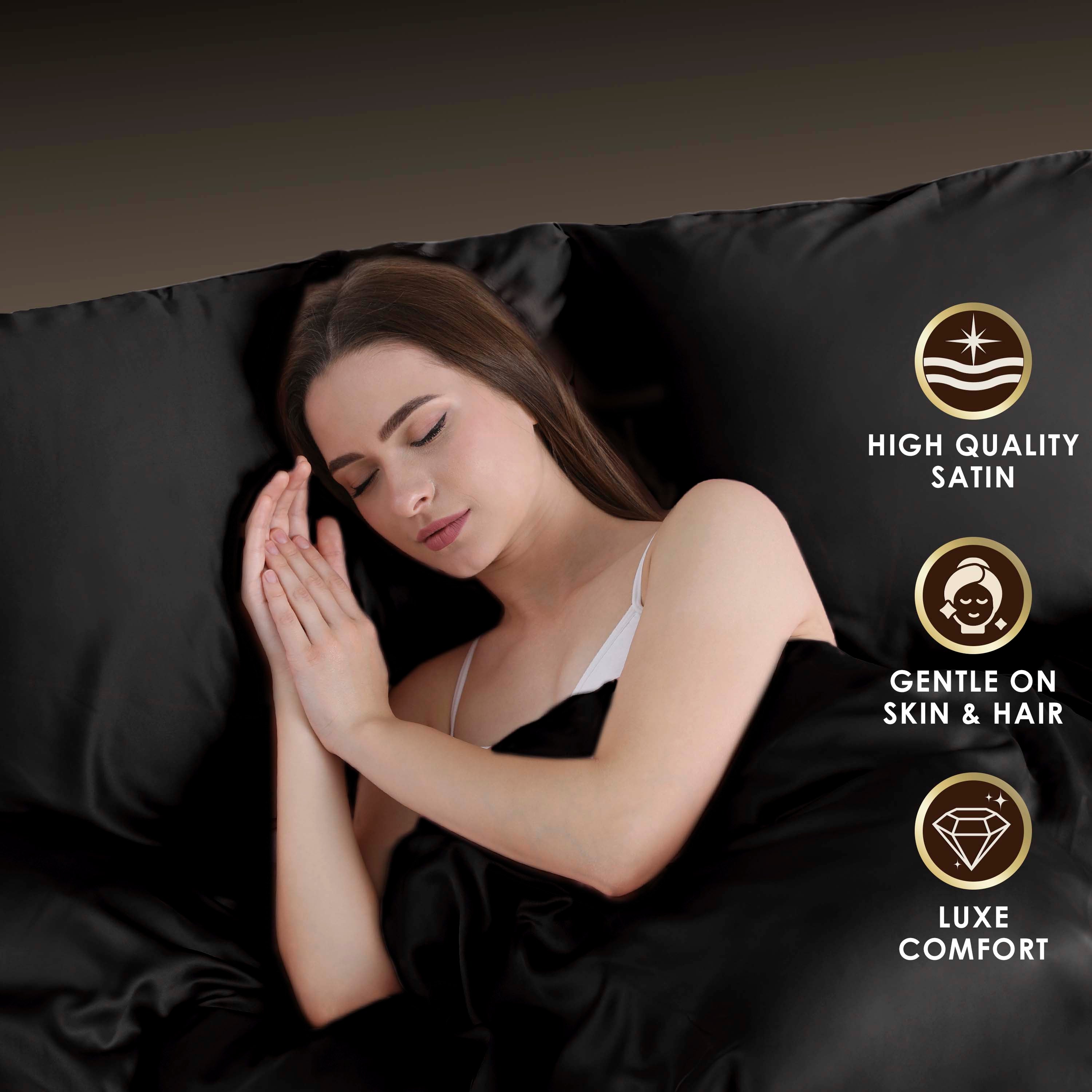 A woman sleeps peacefully on black satin sheets, with icons indicating quality and comfort features.