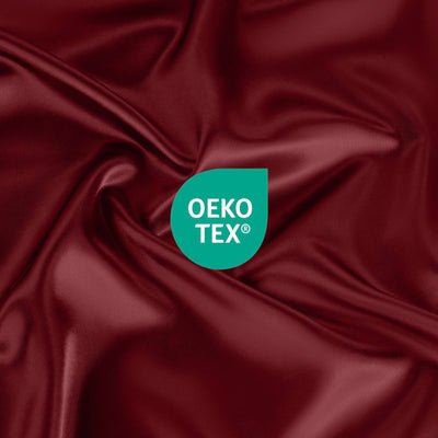Deep red satin fabric with a prominent Oeko-Tex certification logo.
