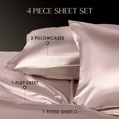 Four-piece satin sheet set including two pillowcases, one flat sheet, and one fitted sheet in a soft color.