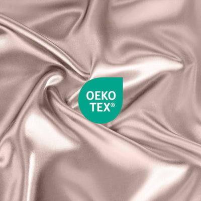 Satin fabric in a light color with an Oeko-Tex certification logo prominently displayed.