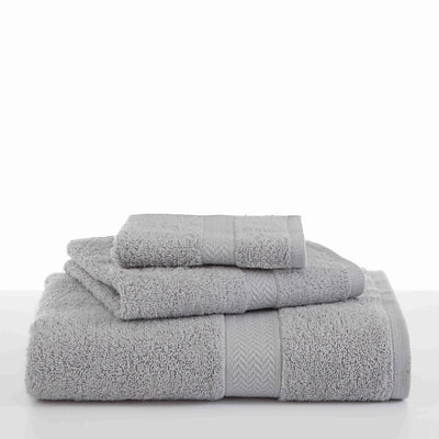 Three stacked gray towels of varying sizes with textured bands.