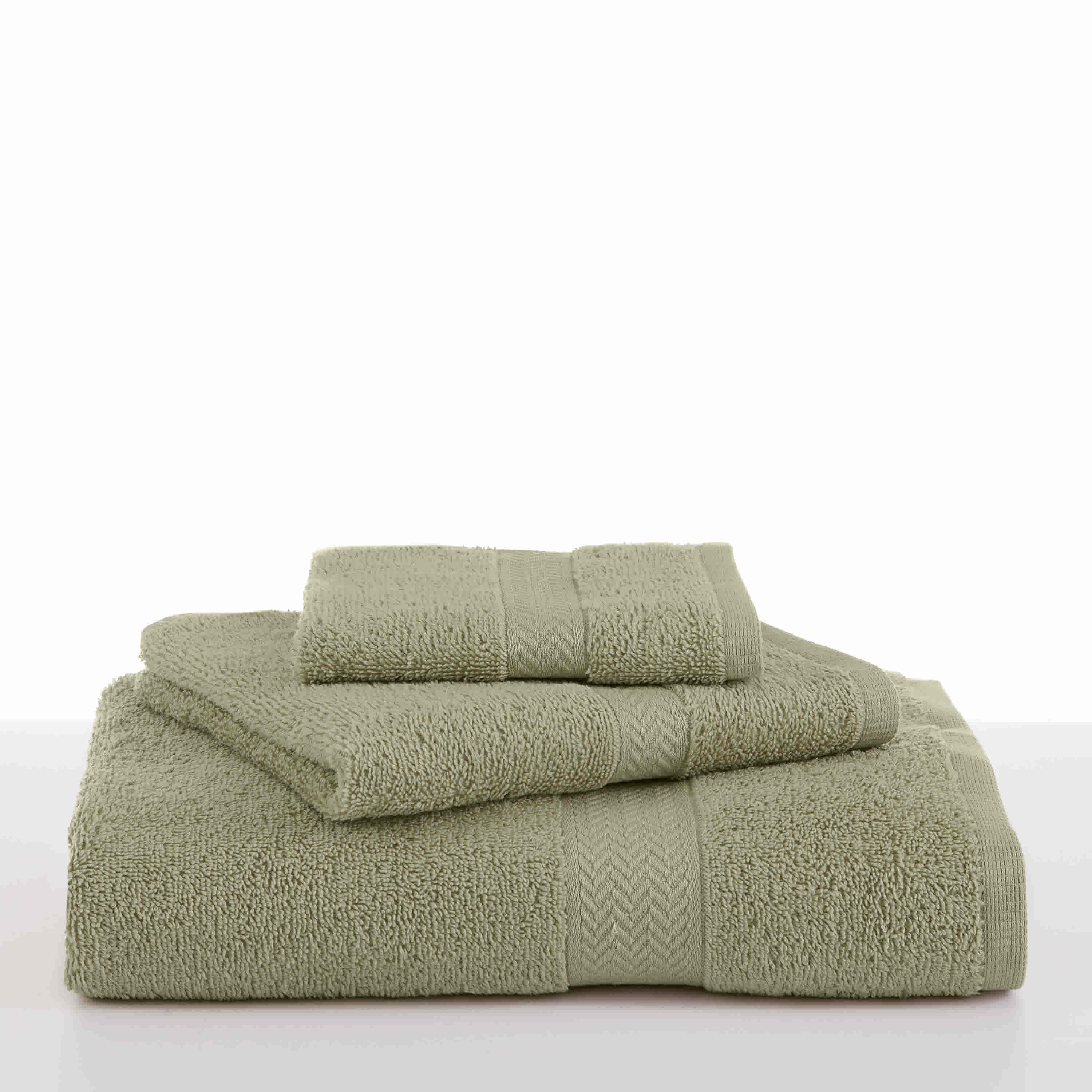 Set of three ringspun towels in a soft green color, featuring textured borders.
