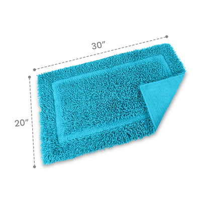 Turquoise bath rug with a plush texture, measuring 30 inches by 20 inches, featuring a bordered design.