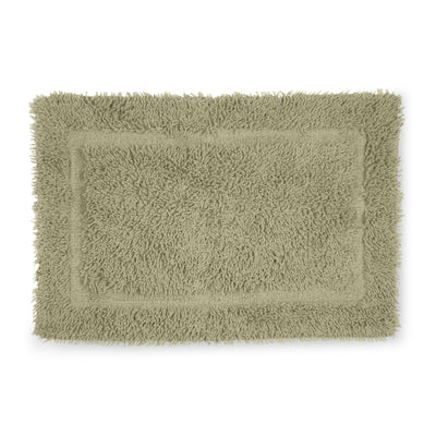 Rectangular bath rug in a soft green color with a plush, textured surface and a bordered design.