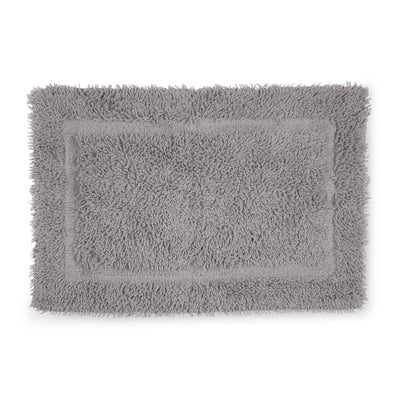 Gray bath rug with a plush, textured surface and a rectangular shape.