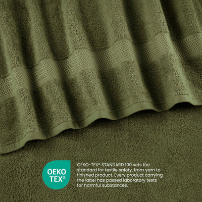 Green towels with a textured stripe pattern, showcasing soft fabric and Oeko-Tex certification for safety.