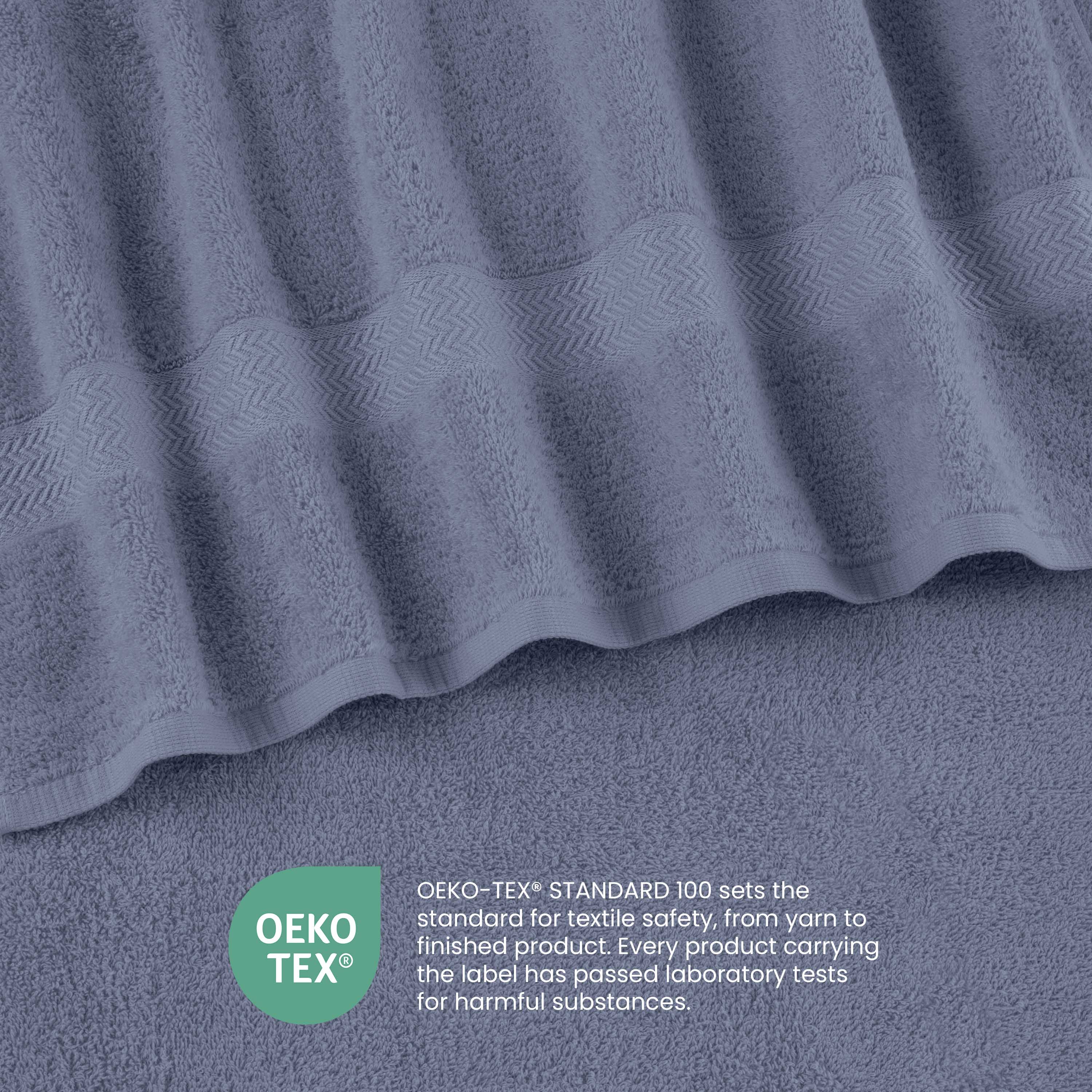 Soft gray towels with textured stripes, featuring Oeko-Tex certification for textile safety.