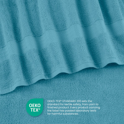 Turquoise towel with textured design and Oeko-Tex certification label for textile safety.