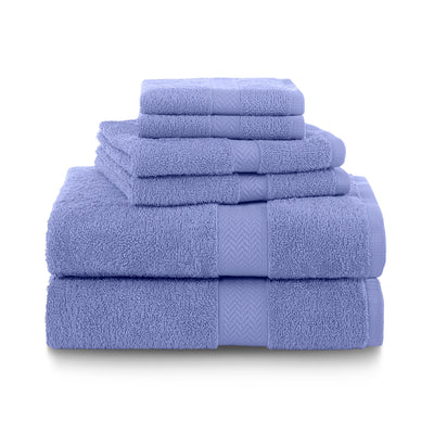 Six towels in varying sizes stacked neatly, all in a light purple color with textured bands.
