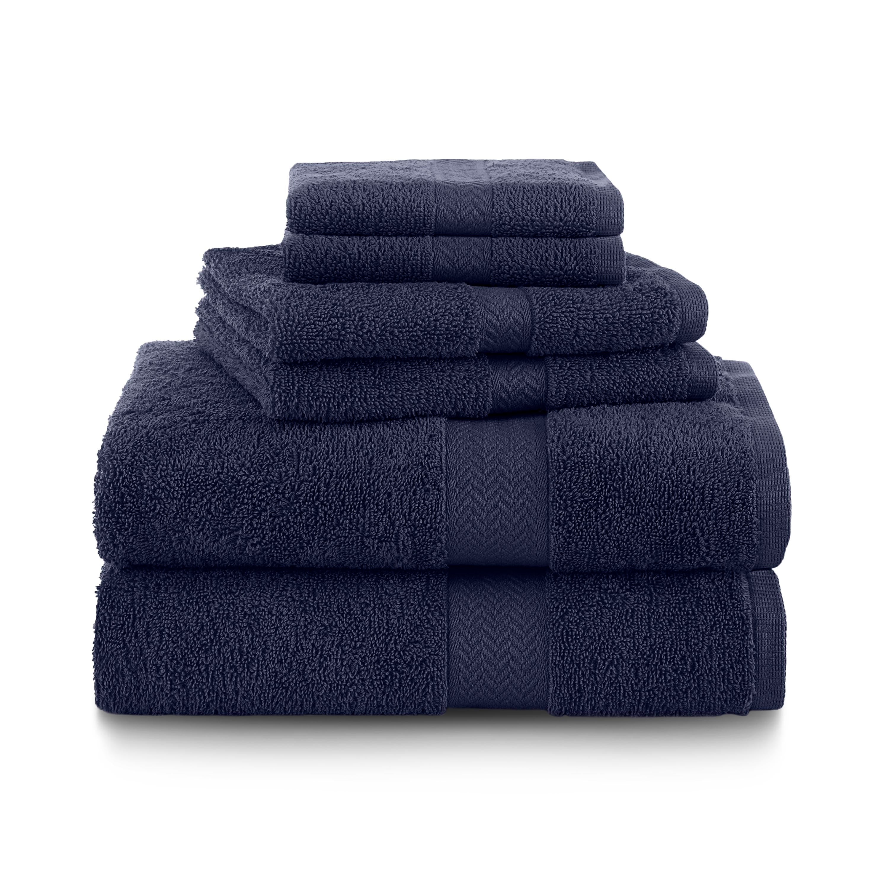 Set of six navy towels stacked in varying sizes, featuring a textured band design.