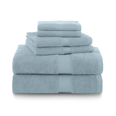 Set of six soft, light blue towels stacked in varying sizes, featuring a textured band design.