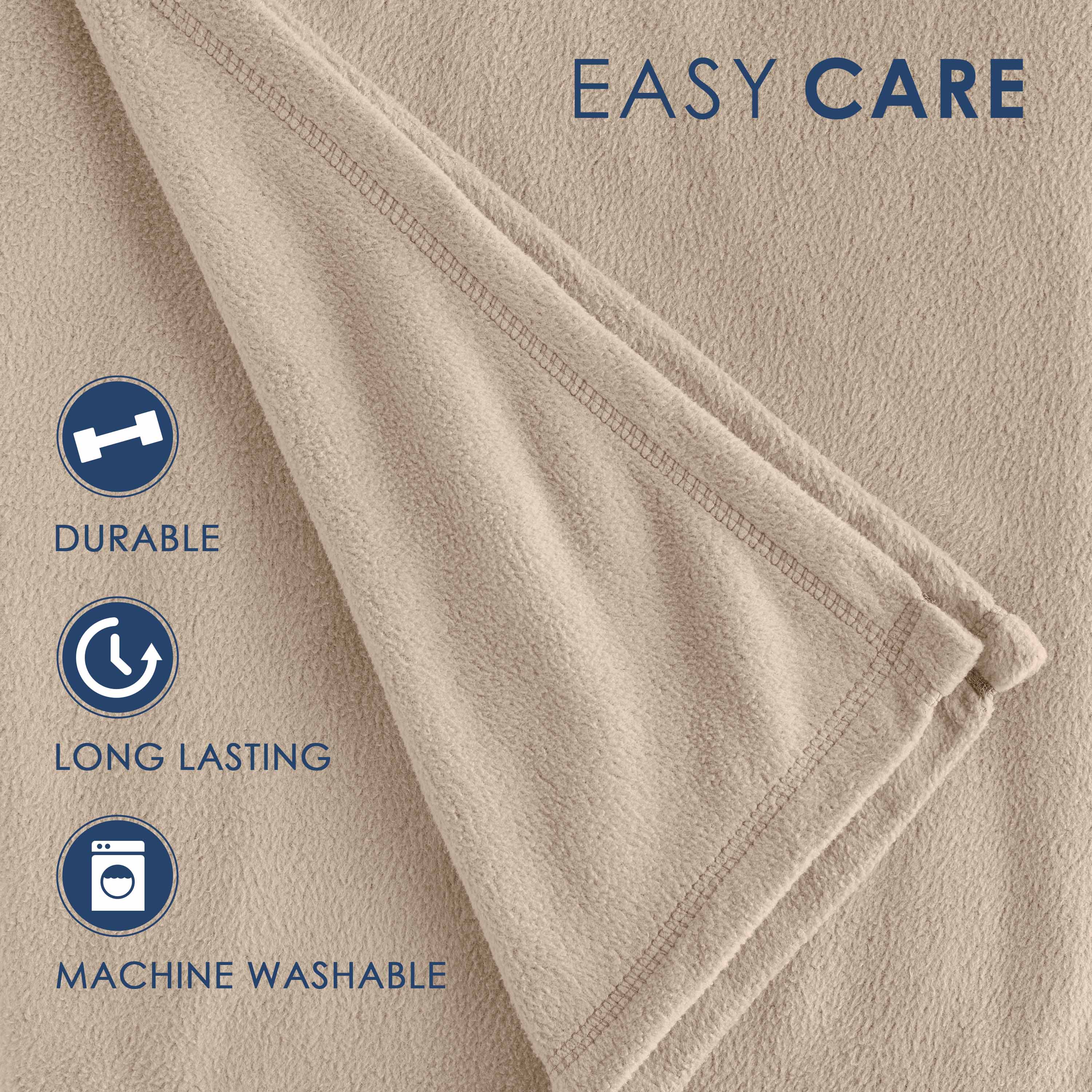 Soft beige fleece blanket with stitched edges and care instructions for durability and machine washability.