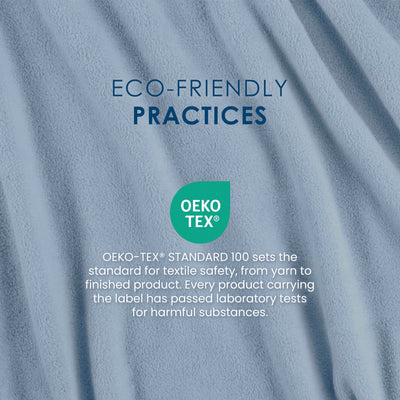 Light blue fleece fabric with text about eco-friendly practices and OEKO-TEX® certification for textile safety.