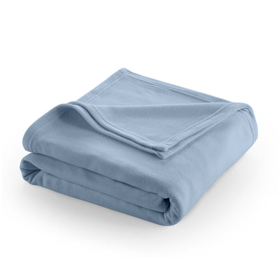Light blue fleece blanket folded neatly with a soft texture.