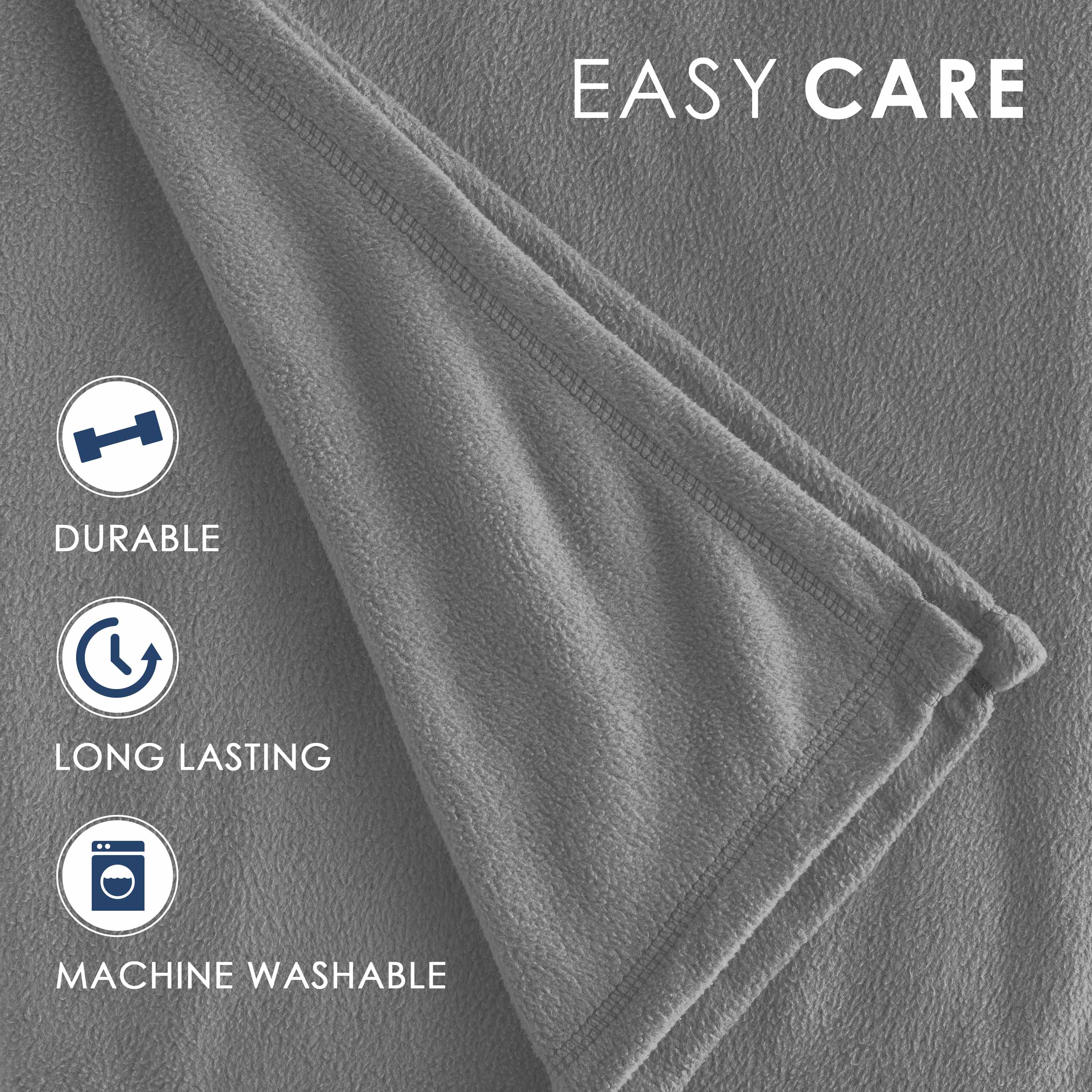 Gray fleece blanket with a soft texture and stitched edges, labeled as easy care and machine washable.