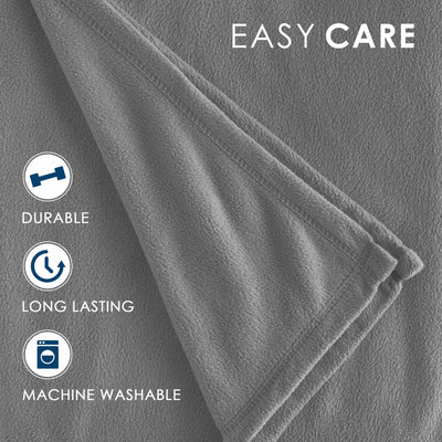 Gray fleece blanket with a soft texture and stitched edges, labeled as easy care and machine washable.
