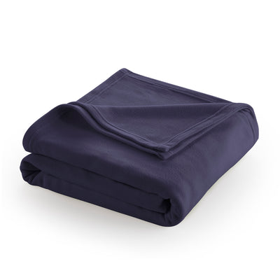 Navy blue fleece blanket folded with a smooth texture and stitched edges.
