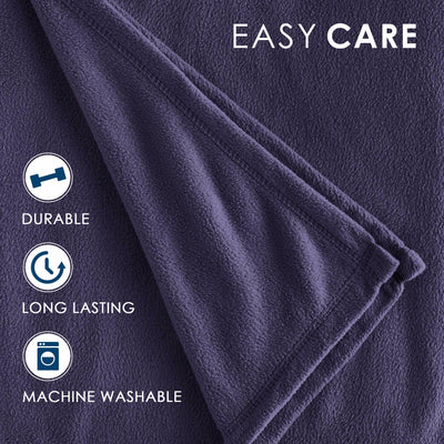 Purple fleece blanket with a soft texture and stitched edges, labeled as durable, long-lasting, and machine washable.