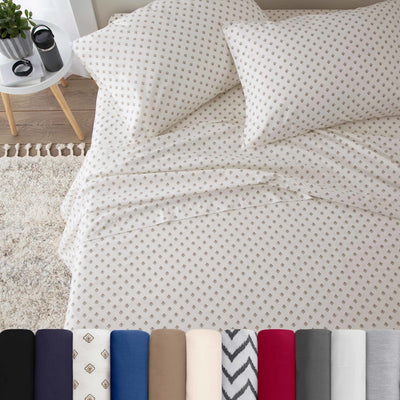 Neatly made bed with foulard white bedding in a bedroom setting.