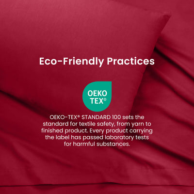 Red bedding with white text reading 'Eco-Friendly Practices' and a teal OEKO-TEX logo and certification description in the center.