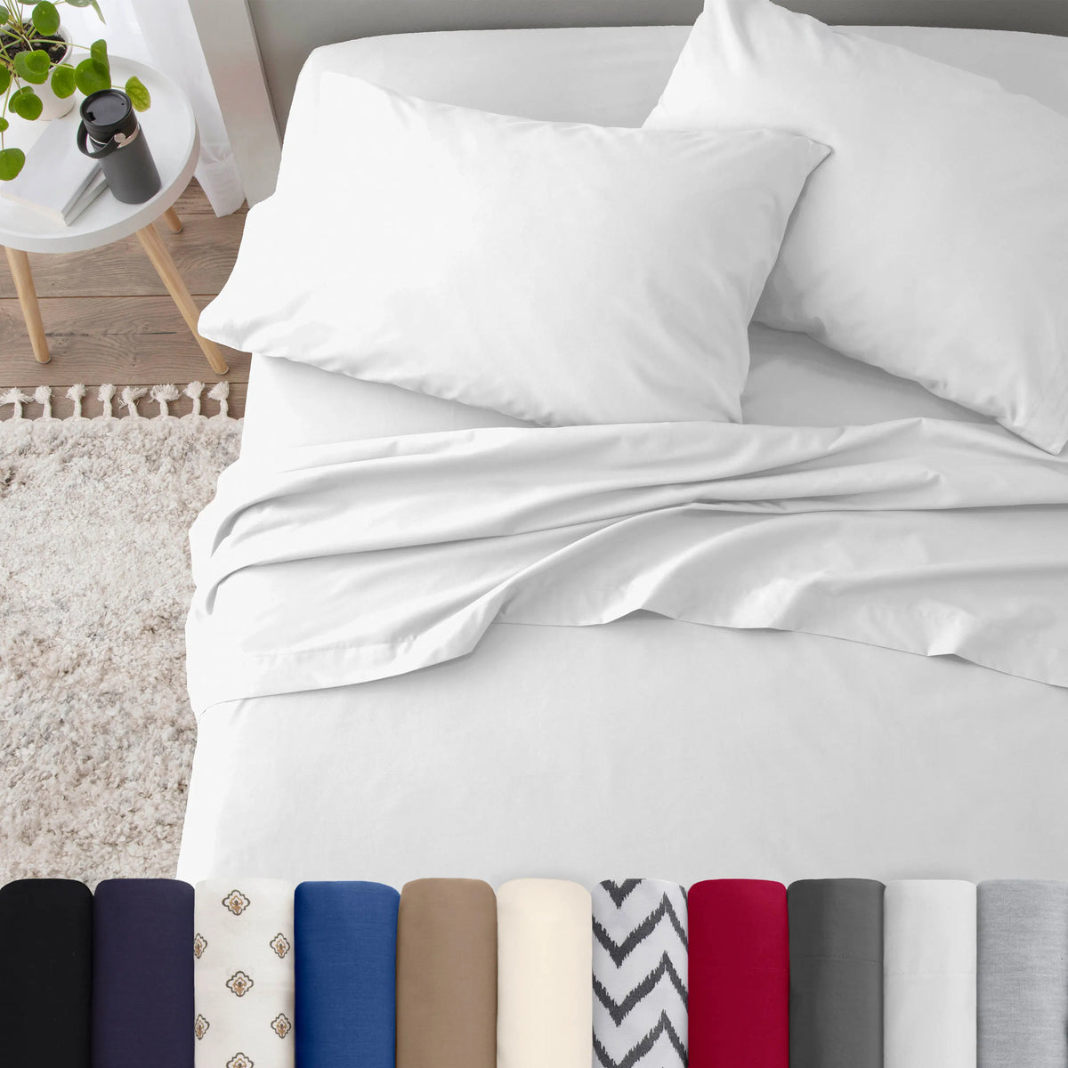 Neatly made bed with white bedding in a bedroom setting.