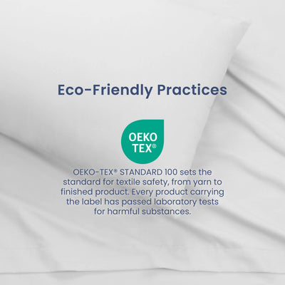 White bedding with a pillow, featuring the OEKO-TEX® STANDARD 100 certification for textile safety.