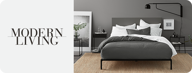 Modern bedroom with gray bedding and 'Modern Living' text on a white background