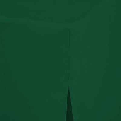 Green round table cover with a seam and a slight drape at the edge.