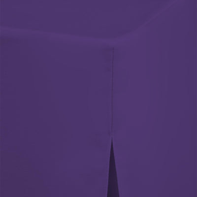 Purple round table cover with a seam and a slight slit at the edge.