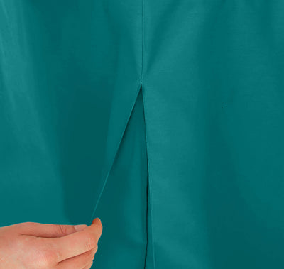 Close-up of a teal table cover with a hand holding a pleat.
