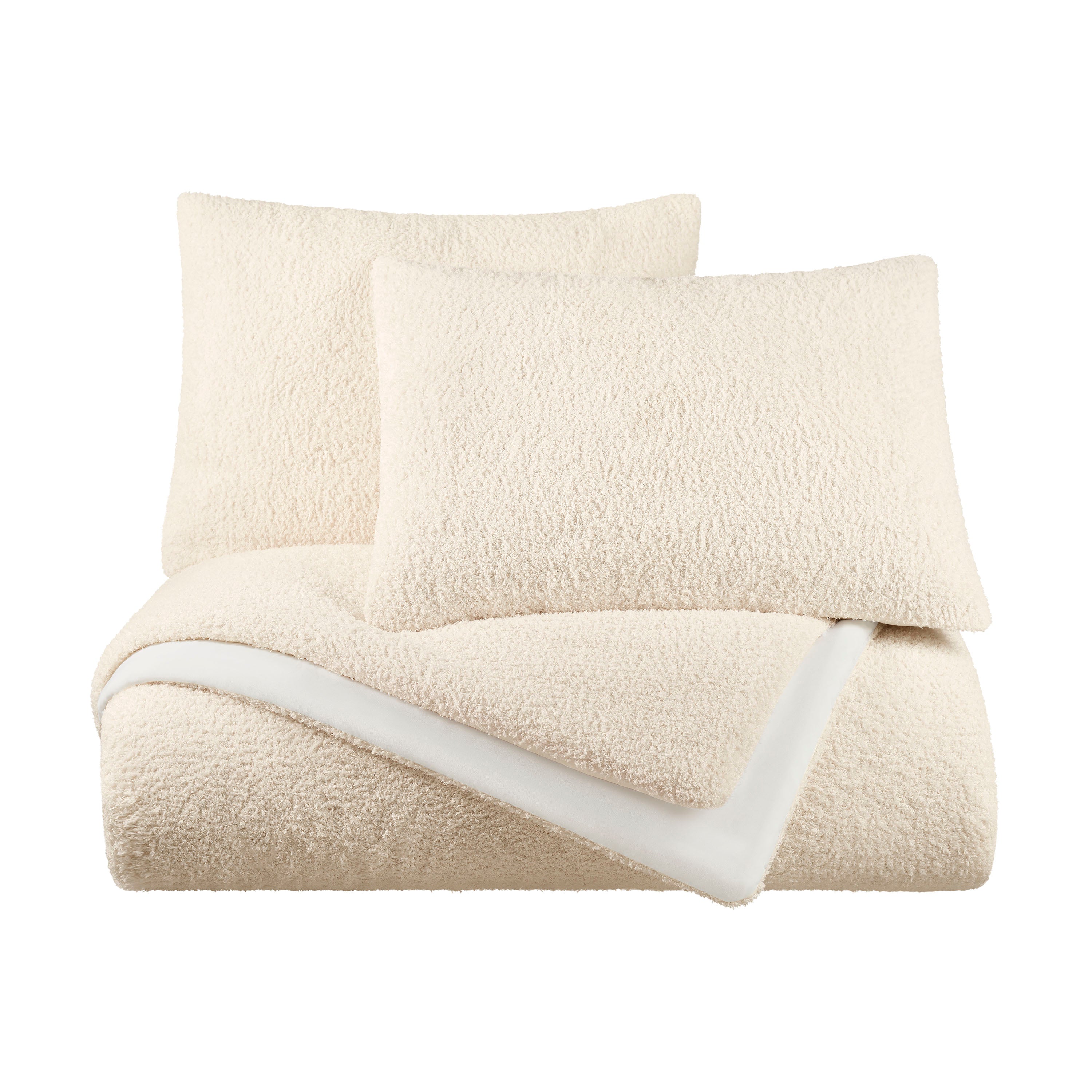 Cream-colored comforter set with a soft, textured surface and two matching pillow shams.