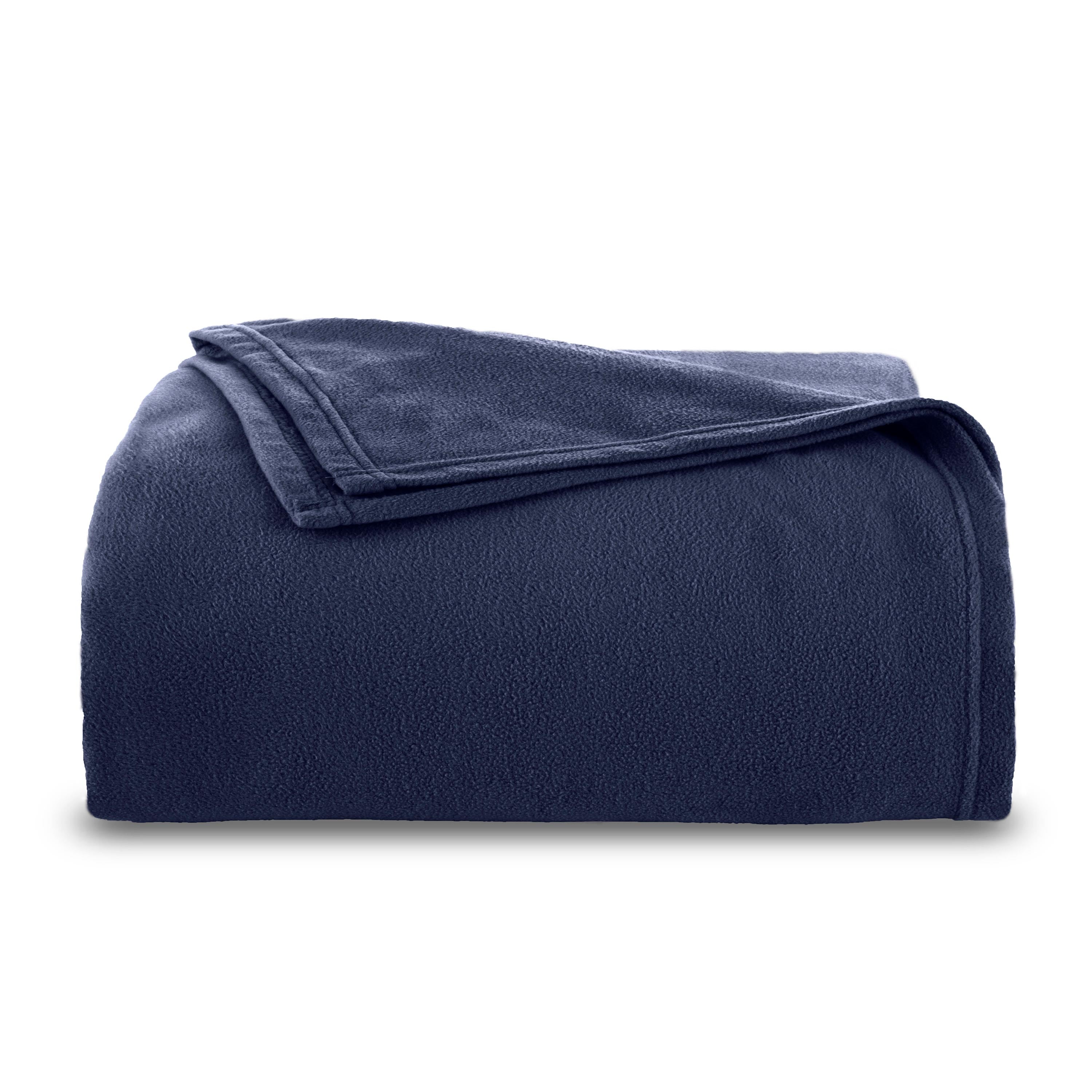 Navy blue micro fleece blanket folded neatly with a soft texture.
