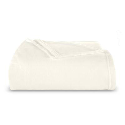White micro fleece blanket folded neatly with a smooth texture.
